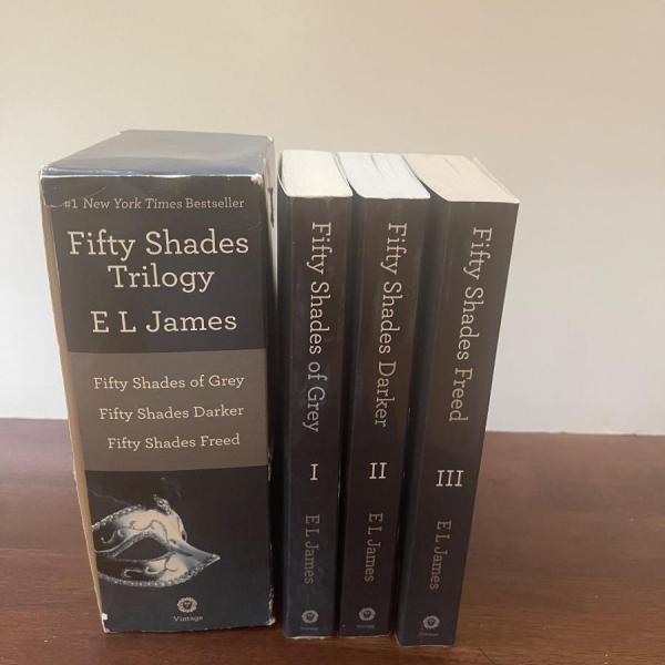 Photo of Fifty Shades of Grey books. Set of 3 Includes all 3 books and the Cardboard Jack