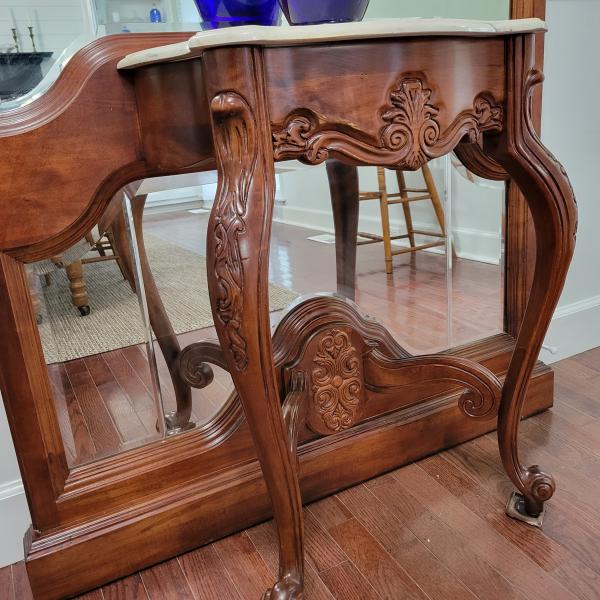 Photo of Mirror and table furniture 
