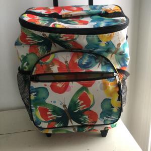 Photo of Insulated floral Bag on rollers with retractable handle.