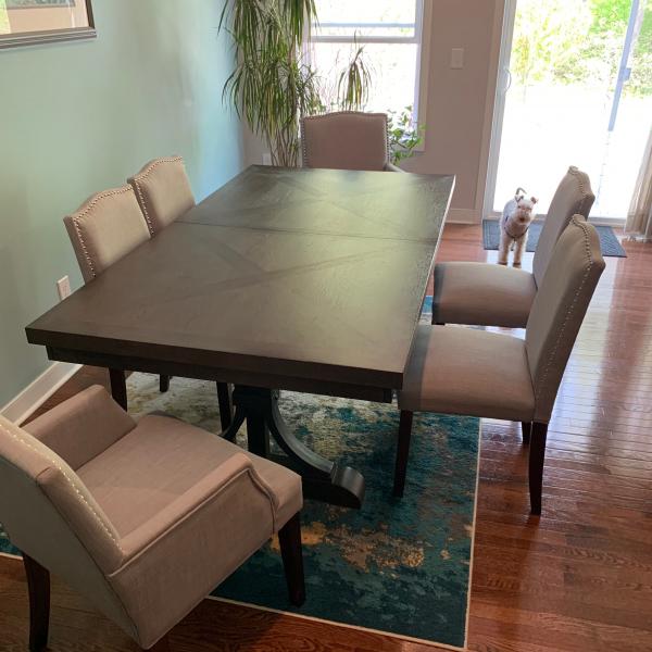 Photo of Large dinning room table and 6 chairs