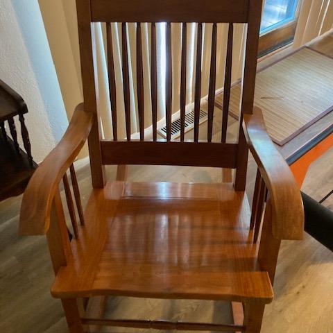 Photo of Wooden rocking chair.