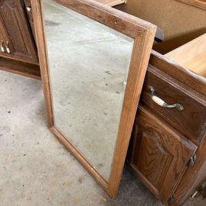 Photo of Wood cabinets & mirror