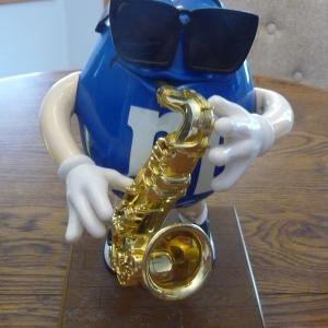 Photo of M & M Dispenser - Blues Cafe Sax  Player