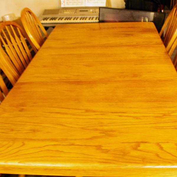 Photo of Solid Oak table and six chairs