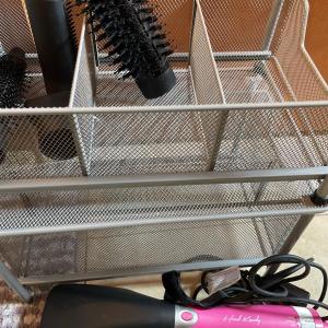 Photo of Hair dryers and storage racks