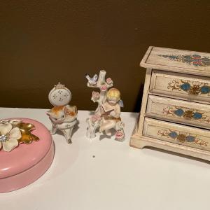 Photo of Pink jewelry holder, box and figurines