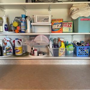 Photo of Various Cleaners Rack and ironing board
