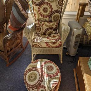 Photo of Vintage Wicker Cushioned Rocking Chair and Foot Stool