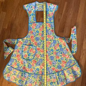 Photo of Full bib yellow blue trim apron with floral flowers blue/pink