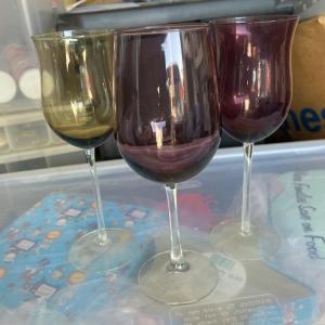 Photo of 3 delicate colored wine glasses