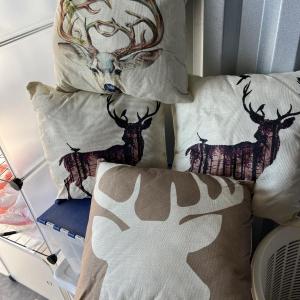 Photo of Deer elk themed throw pillows