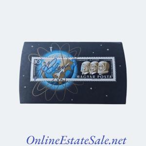 Photo of John Glenn signed stamp