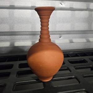 Photo of Adobe style vase