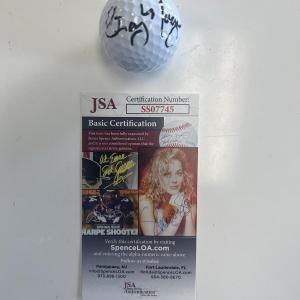 Photo of Caddyshack Cindy Morgan signed golf ball. JSA