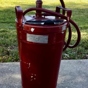 Photo of Vintage hand pump fire extinguisher holds 4 gallons