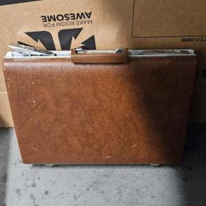Photo of Brown Suitcase