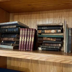 Photo of Lot of Antique Books Dating Back Late 1800's