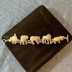 Photo of Lot 146, Sterling silver, wild animal bracelet