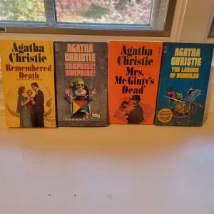 Photo of Nine Agatha Christie Paperbacks (UH-DW)