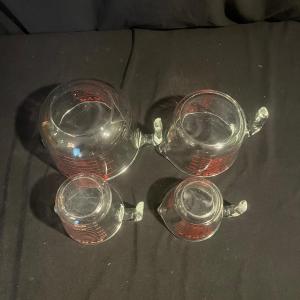Photo of Four Pyrex Measuring Cups (K-MG)
