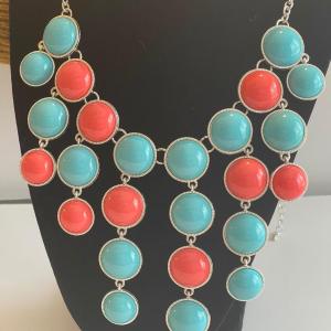 Photo of Aqua and coral-look stone multi-layer necklace. 24”. Adjustable.