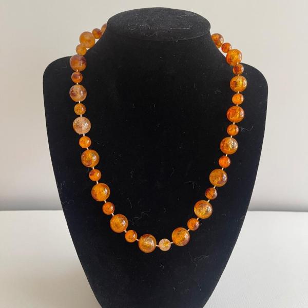 Photo of Vtg 18” Amber colored beaded necklace
