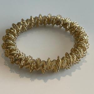Photo of Gold tone stretch bracelet. Vtg