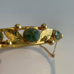 Photo of Gold filled bracelet with jade-like stone. Safety chain.