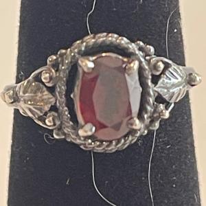 Photo of Ruby and silver -tone ring. Size 5