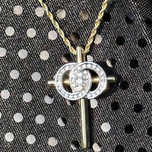 Photo of 14 k gold and diamond marriage symbol necklace