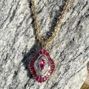 Photo of 14 k gold and ruby necklace