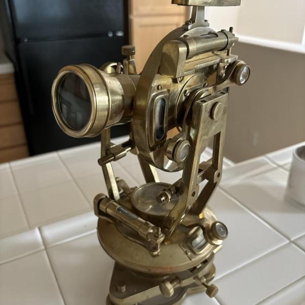 Photo of Vintage brass surveyor compass telescope