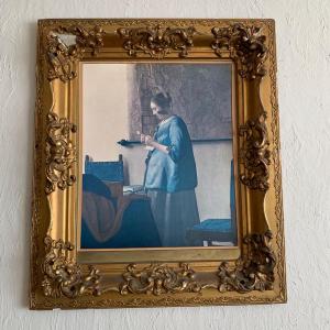 Photo of Large Print of Johannes Vermeer painting in ornate gilt gold frame
