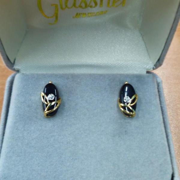 Photo of 14kt gold black onyx earrings