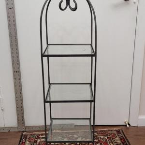 Photo of Black iron 3 tier plant stand.