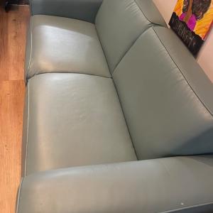 Photo of Blue Leather Sofa