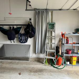 Photo of LOT 77: Garage Finds: Ladder, Backpacks / Tote, Shepherd Hook, Shelf Unit and Co