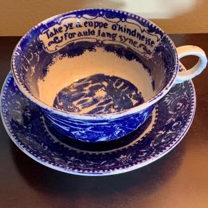 Photo of Large Flow Blue Cup & Saucer England