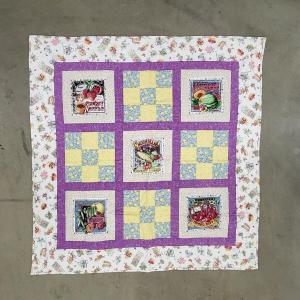 Photo of Quilted Baby Blanket Outdoors Spring Theme