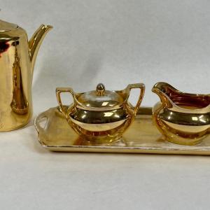 Photo of Coffee or Tea Pot with sugar bowl, creamer, and tray Gold Porcelain 1938