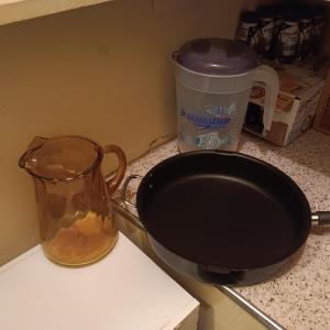 Photo of LARGE NORDIC WARE SKILLET, GLASS AND PLASTIC PITCHERS