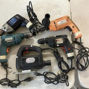 Photo of 258 Lot of 4 Drills and a Jig Saw