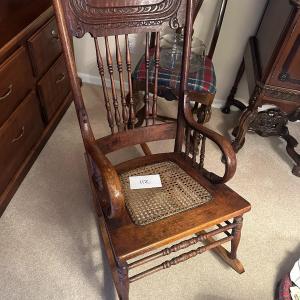 Photo of Antique Rocker with wicker seat