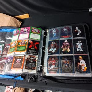 Photo of 3 RING NOTEBOOK WITH FOOTBALL, BASKETBALL, BASEBALL AND OTHER TRADING CARDS