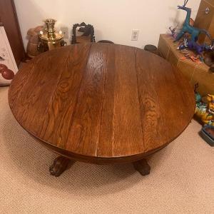 Photo of Hand Carved Pedestal Round Table with Lion's Paw Feet