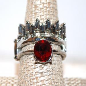 Photo of Size 9 "Crown" Style Ring with Red Oval Main Stone on Expandable Silver Tone Ban