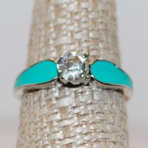 Photo of Size 7 Round Cut Clear Stone Ring with 2 Aqua Side Inlays (2.5g)