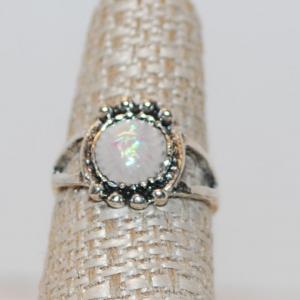 Photo of Size 7 Round Irridescent Moonstone Ring with 8 Spheres Surround (2.3g)