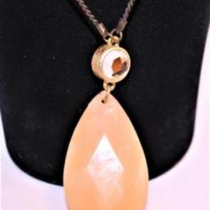 Photo of Large Faceted Pink Teardrop Stone with Mirror Circle & Small Bead Accents 32" L