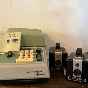 Photo of Vintage Adding Machine and Kodak Cameras
